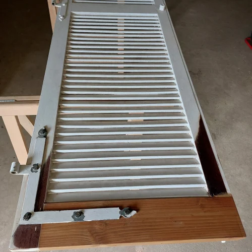 Réparation d'un volet en bois